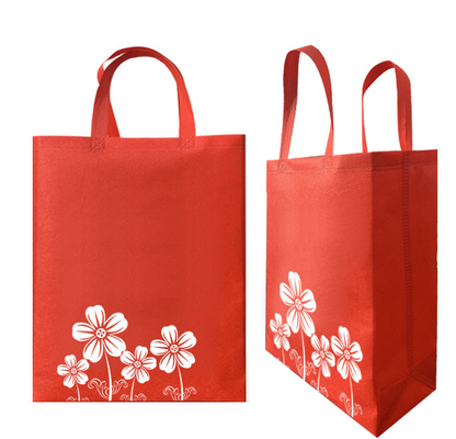 Les sacs non tissés non tissés rouges de client de Carry Bags 80g ont adapté aux besoins du client
